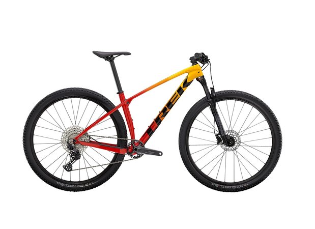 Bicykel Trek Procaliber 9.5 Marigold to Radioactive Red Fade 2021