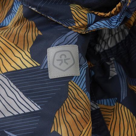 Detský overal Color Kids Coverall W. 2 ZIP AOP Orange Pop Detský overal Color Kids Coverall W. 2 ZIP AOP Orange Pop